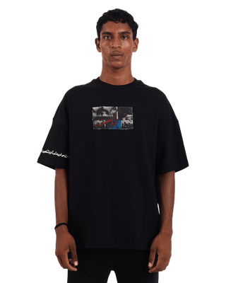 "Perpetual motion" oversized black T-shirt