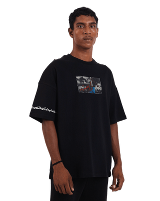 "Perpetual motion" oversized black T-shirt