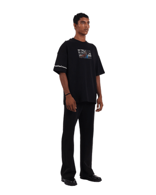"Perpetual motion" oversized black T-shirt