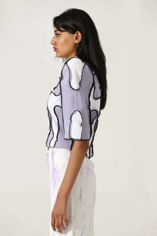 Upcycled paneled top