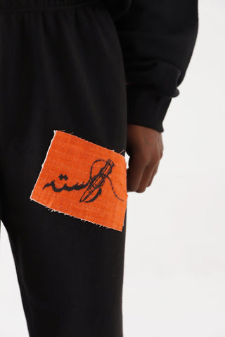 "BREATH OF FIRE" HANDPRINTED SWEATPANTS - Rastah