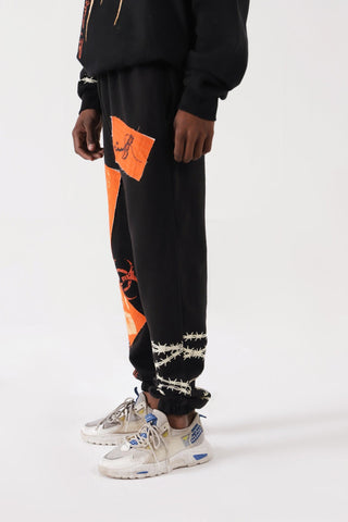 "BREATH OF FIRE" HANDPRINTED SWEATPANTS - Rastah