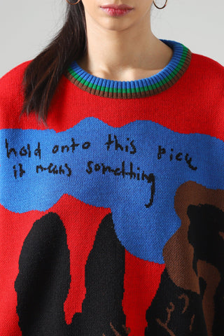 "This means something" jacquard knit sweatshirt