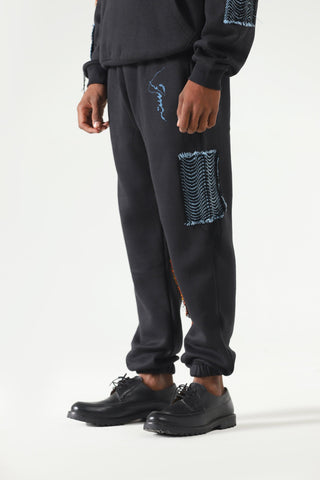 Handwoven patch sweatpants