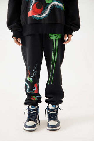 "DISTORTION AMONG US" HAND PRINTED SWEATPANTS - Rastah