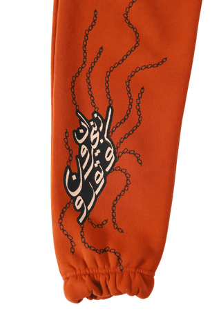 "ENLIGHTENMENT" RUST SWEATPANTS