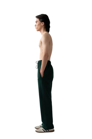 Rastah emerald green heavyweight terry knit bottoms with a relaxed straight-leg fit and elastic waistband.
