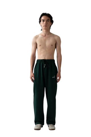 Rastah emerald green heavyweight terry knit sweatpants with an elastic waistband and embroidered logo detail.