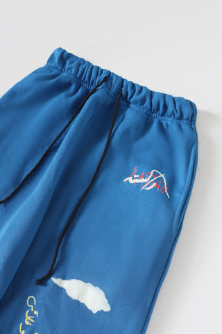 "Learning to fly" sky blue sweatpants