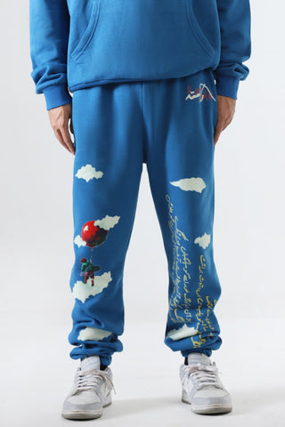 "Learning to fly" sky blue sweatpants