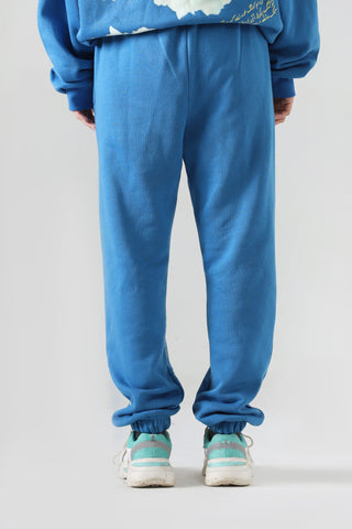 "Learning to fly" sky blue sweatpants